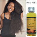 "Applying African Traditional Handmade Layden Oil Hot Hair treatment"