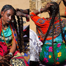 "Applying African Traditional Handmade Layden Oil Hot Hair treatment"